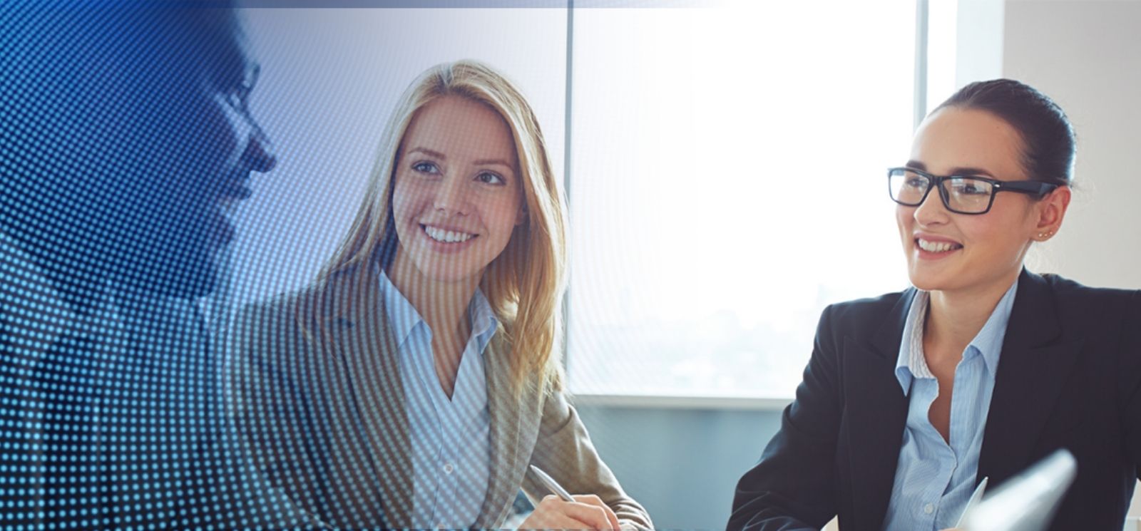 Two women and man making a business deal with blue mesh overlay