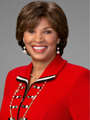 Smiling woman with red jacket